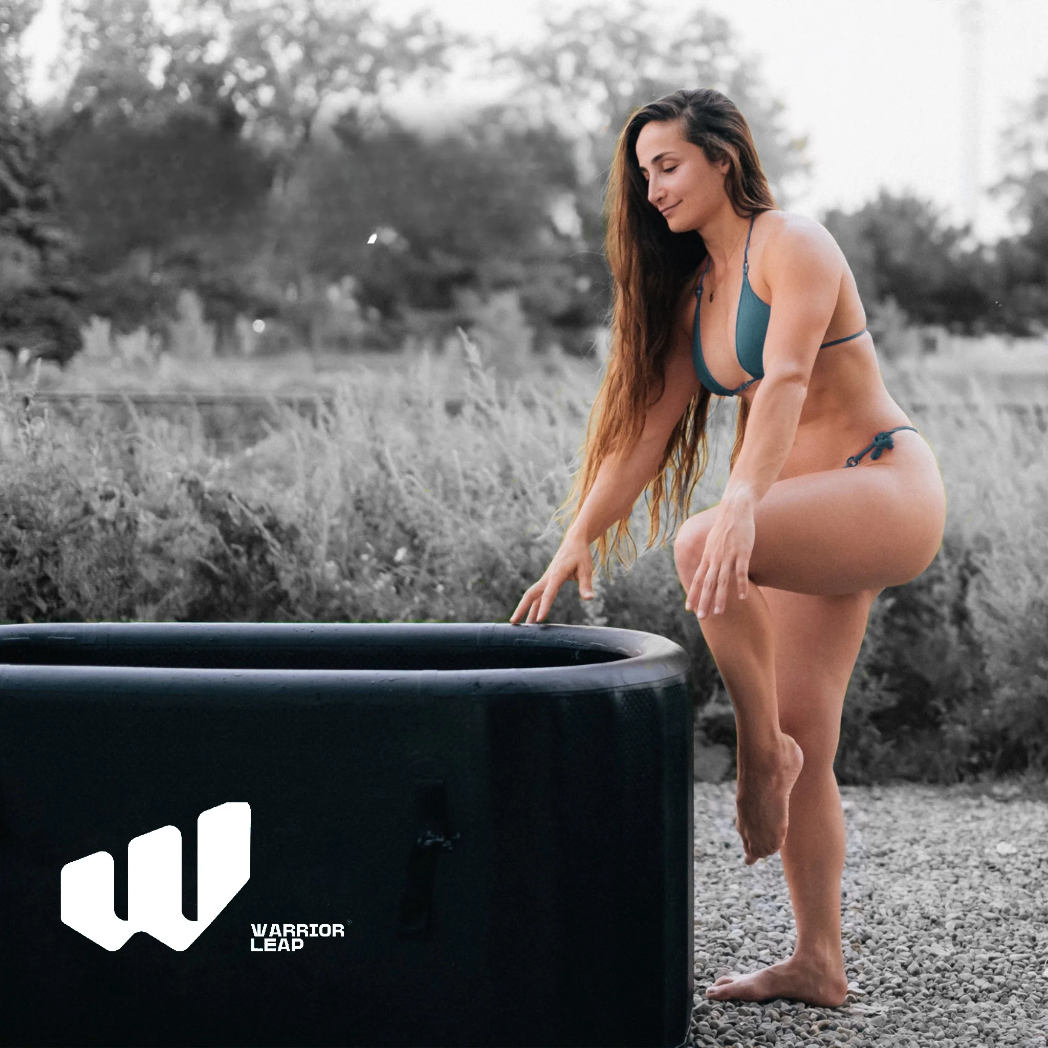 Person entering ice tub for cold therapy recovery in Lebanon